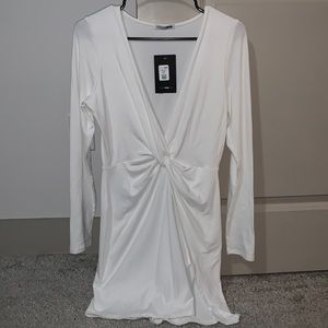 Long sleeve white dress with open chest